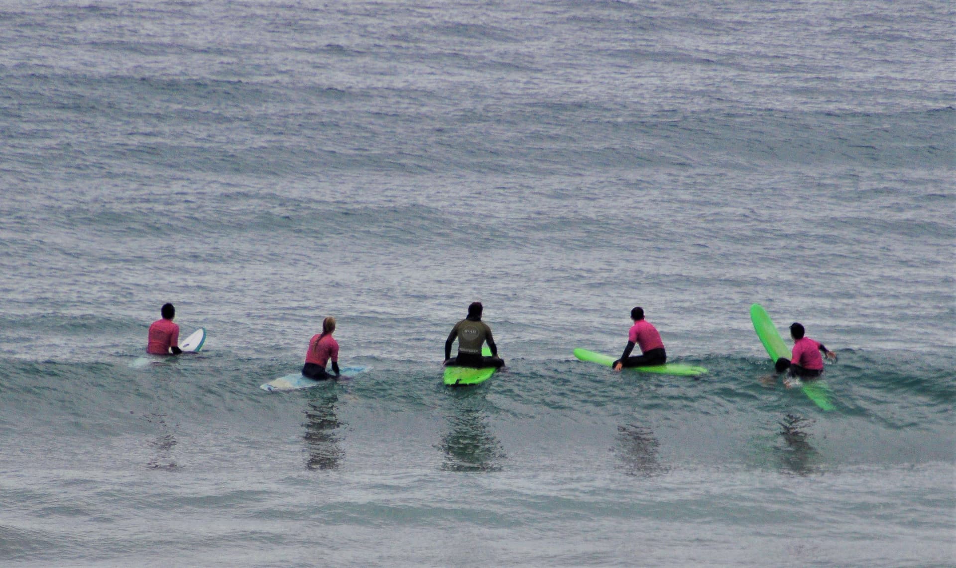 Group surf lessons: Learn and improve your technique in the water